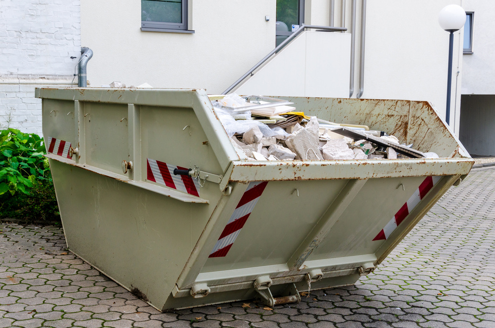 Construction waste container full of construction waste